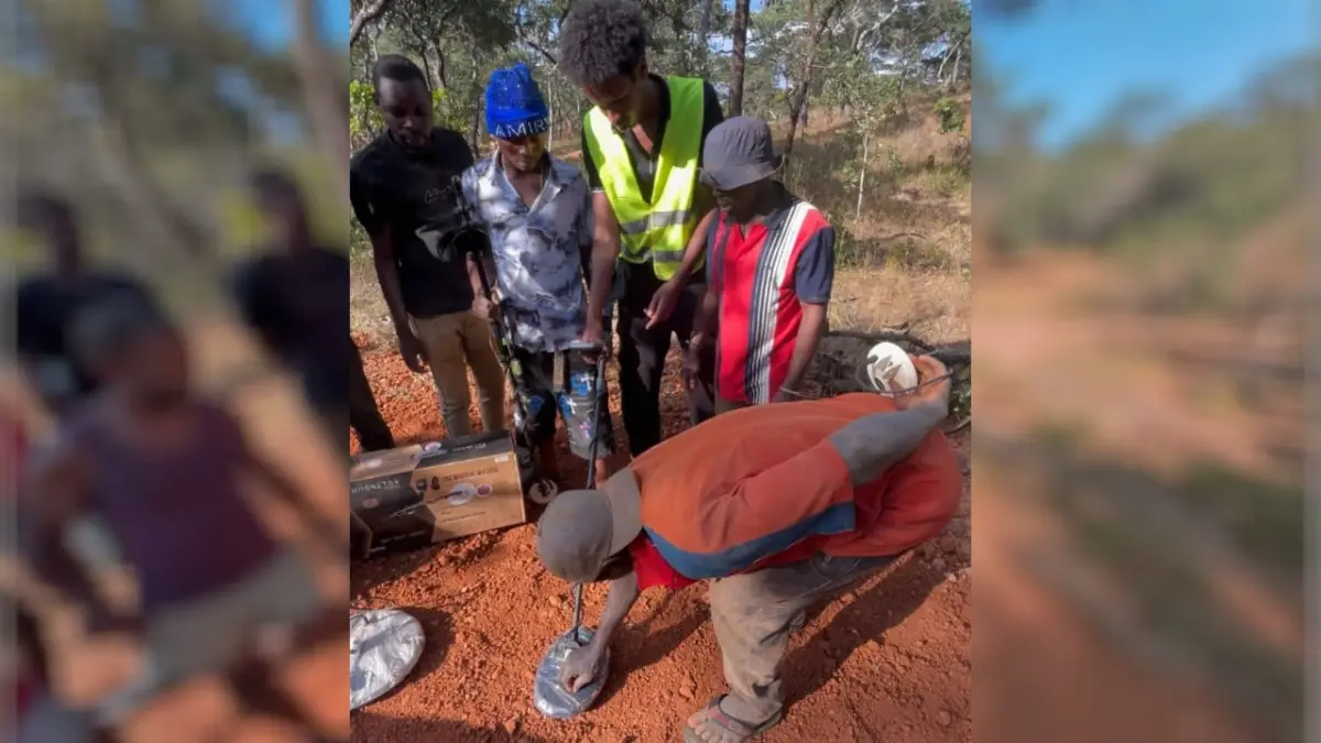 Gold detector standing in worked ground